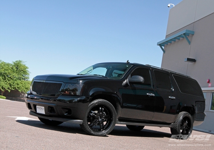 2009 Chevrolet Suburban with 22" MKW M105 in Black (Satin) wheels