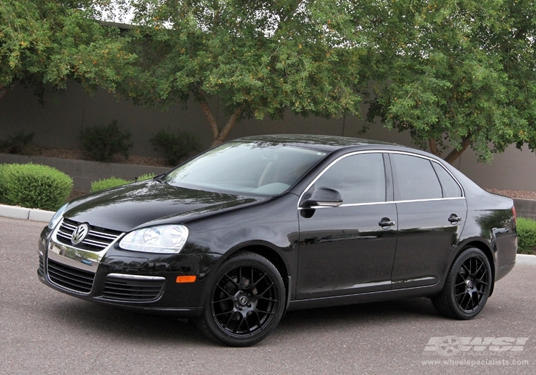 2010 Volkswagen Jetta with 18" Enkei Raijin in Matte Black wheels