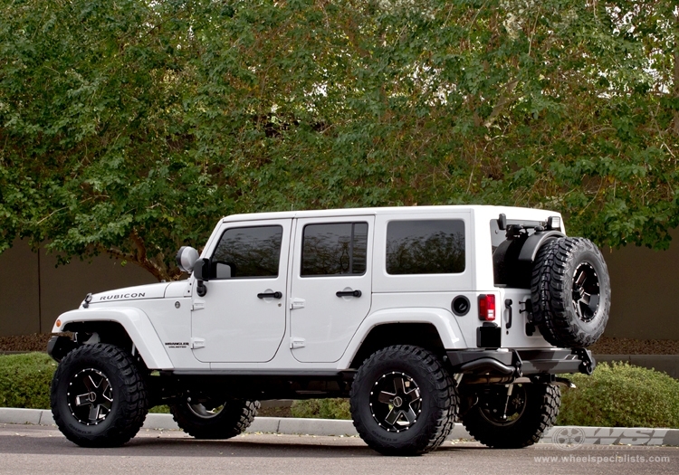2012 Jeep Wrangler with 17" Hostile Off Road Moab-5 in Black Milled (Blade Cut) wheels