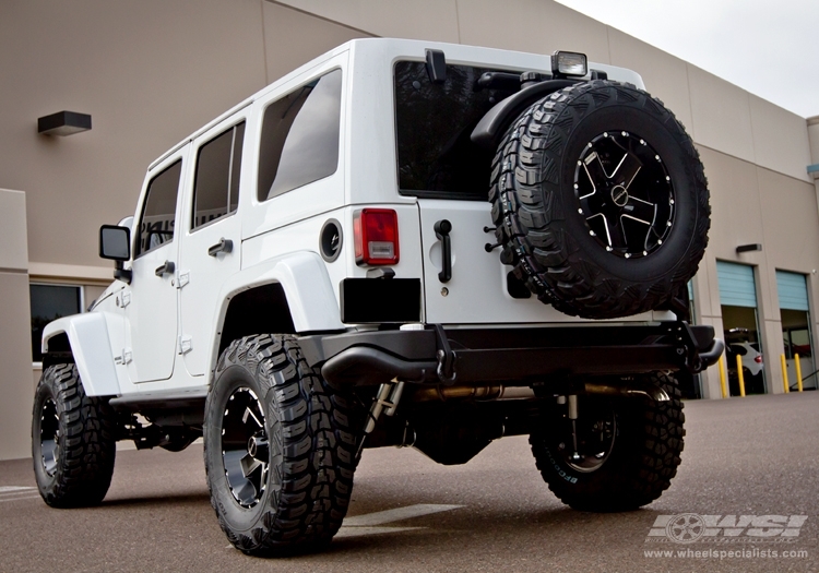 2012 Jeep Wrangler with 17" Hostile Off Road Moab-5 in Black Milled (Blade Cut) wheels