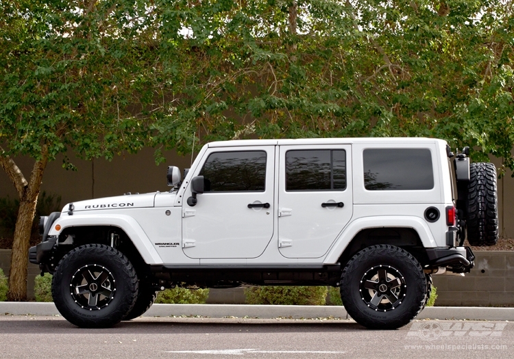 2012 Jeep Wrangler with 17" Hostile Off Road Moab-5 in Black Milled (Blade Cut) wheels