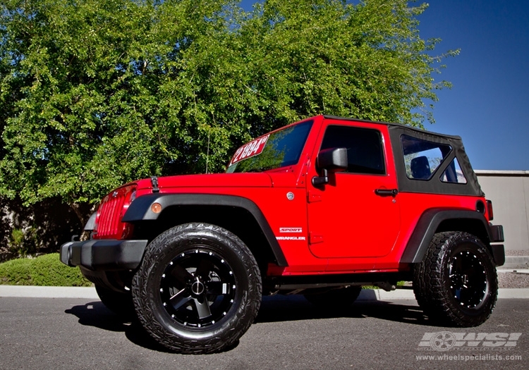 2011 Jeep Wrangler with 17" Hostile Off Road Moab-5 in Black (Asphalt) wheels