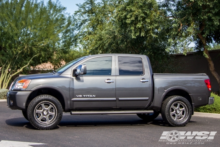 2011 Nissan Titan with 20" Hostile Off Road H105 Exile-6 in Gunmetal Machined (Iron Cut) wheels