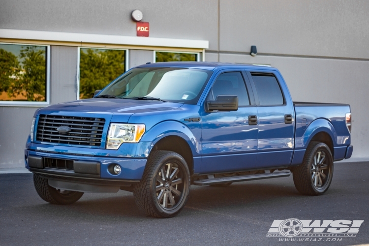 2014 Ford F-150 with 22" Heavy Hitters HH10 in Black wheels