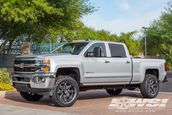 2015 Chevrolet Silverado 2500HD with 20" Hostile Off Road H109 Alpha in Gloss Black Milled (Blade Cut) wheels