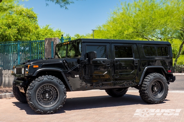 2006 Hummer H1 with 20" Black Rhino Armory in Gun Black wheels