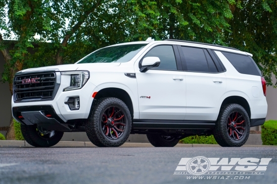 2023 GMC Yukon with 20" Fuel Rage D712 in Gloss Black (w/ Candy Red) wheels